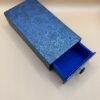 a blue box with a lid open